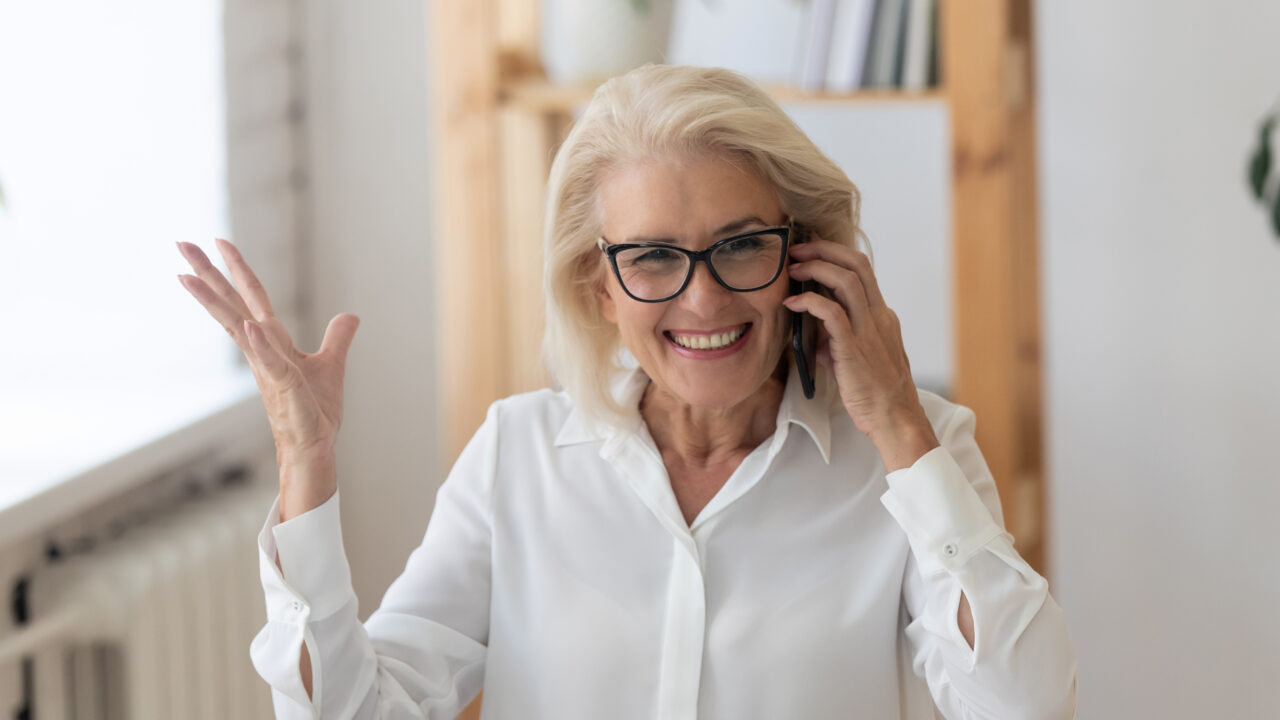 An older woman answers a personalized call from an association's membership drive designed to increase memberships.