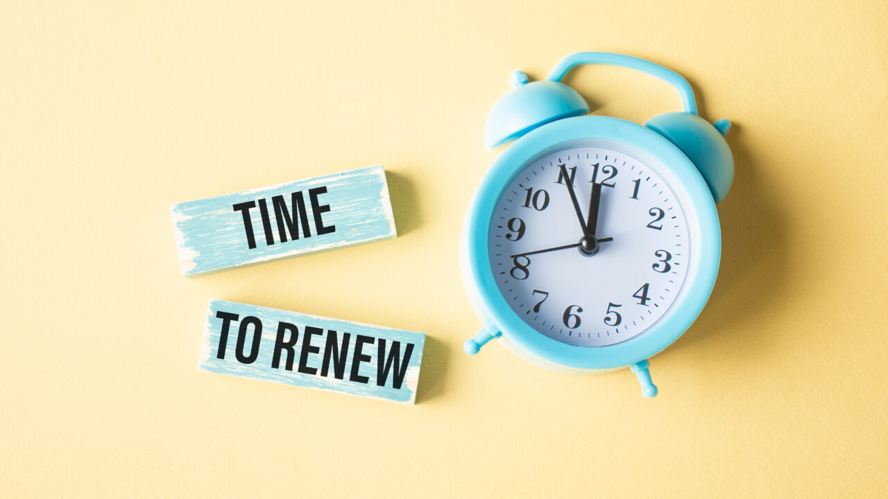 The words "Time to Renew" next to an alarm clock that indicates a membership needs to be renewed.