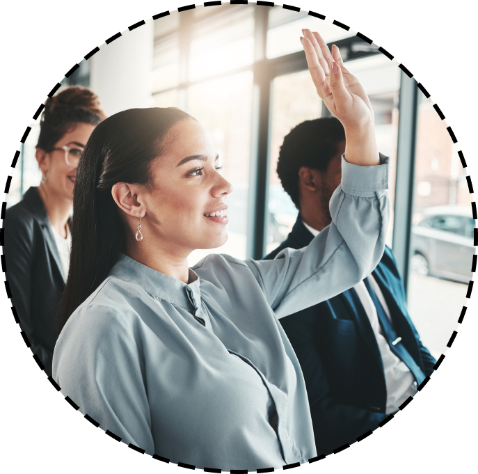 a woman raises her hand